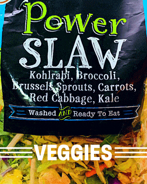 Quick power slaw stir-fry over rice with cabbage and greens.